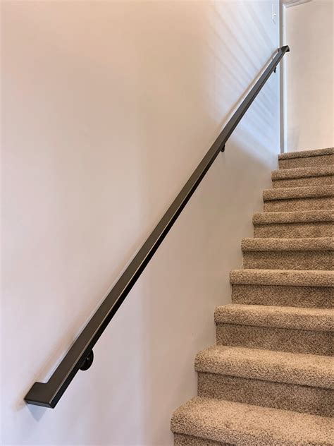 wall mounted black metal handrail